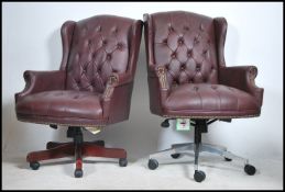 A pair of contemporary antique style Chesterfield Style mahogany and ox-blood leather button back