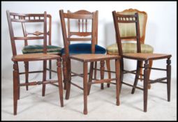A collection of chairs to include a French overstuffed fauteuil chairs, caned Edwardian bedroom