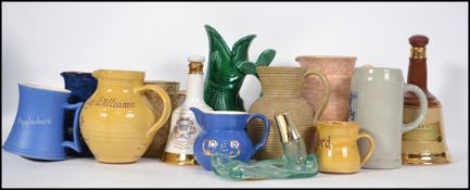 A collection of original assorted breweriana to include; 2x Bell's whiskey bells, Dartmouth fish