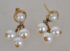 2 pairs of vintage 9ct gold pearl earrings - studs complete with the posts, each earring with good