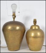 A pair of retro 1980's hand beaten effect brass table lights originally purchased from Habitat.
