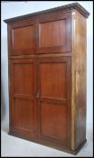 An Edwardian mahogany housekeepers cupboard wardro