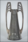 A 19th century WMF silver Britannia metal Art Nouveau twin handled vase. Measures 15cm tall