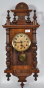 An early 20th century mahogany cased Vienna wall clock in the manner of Gustav Becker having