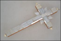 A late Victorian Mother of Pearl Faced Wooden Cross with Jerusalem to verso, circa 1900. A wooden
