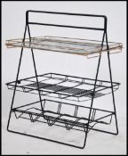1950's retro drinks serving tray / magazine rack with carry handle.  This unusual item has a