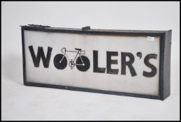 A 1970's metal and frosted acryllic ' Woolers ' double sided shop advertising industrial sign with