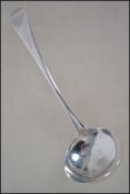 A silver hallmarked George 3rd table ladel by believed Peter Anne & William Bateman ( marks