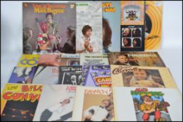 A collection of comedy long play vinyl records to include The Rutles ( Beatles parody ), Jasper