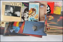 A collection of vinyl long play LP records dating from the 70's and 80's to include various