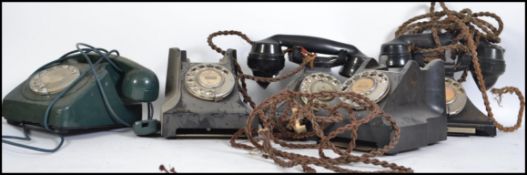 A group of mid 20th century Bakelite ring dial telephones together with a retro ring dial