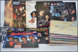 A collection of long play vinyl LP's records, to include The Rolling Stones, Reo Speedwagon,