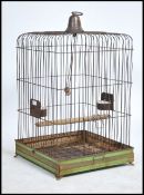 A Victorian-style brass hanging bird cage, 20th Century Being of square form with domed top having a