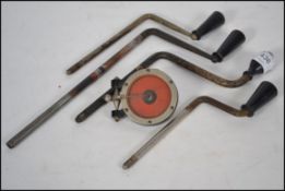A group of four vintage early 20th century gramophone winding crank handles.