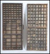 A pair of early 20th century Industrial printers block trays. Each with segmented areas with