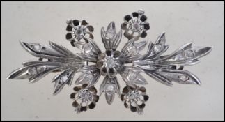 An early 20th century century silver and gold ladi