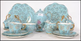 A collection of ceramics to include a Laurie & Co of London part tea service along with other