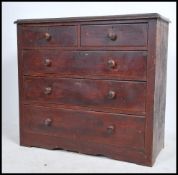 A Victorian country pine 2 over 3 chest of drawers having 2 short over 3 deep drawers with knob
