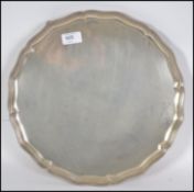 A large and heavy silver hallmarked salver tray wa
