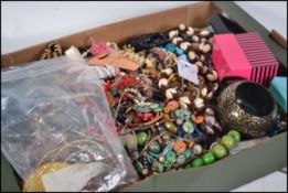 A good large collection of assorted costume jewellery to include bangles, bracelets, necklaces etc