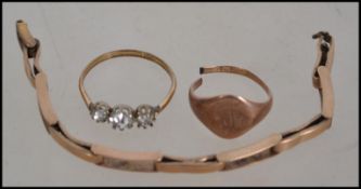 A 9ct gold gentlemans signet ring  ( af ) together with a 9ct gold watch bracelet ( af ) along