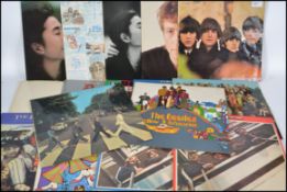 A collection of The Beatles and John Lennon vinyl long play / LP's records to include Beatles For