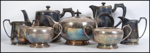 An Art Deco silver plated three piece tea service together with another vintage tea service. The