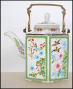 A 19th century Chinese - Canton octagonal teapot with scenes of bids, butterfly's and foliates to