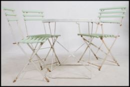 A mid century vintage strap painted cast iron and