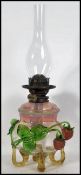 A rare 19th century optic art glass full size oil lamp in the form of a berry having stunning