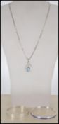 Two silver hallmarked and stamped 925 bracelet bangles together with a silver necklace with a blue