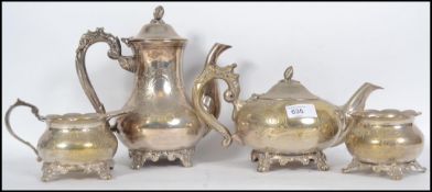 A collection of silver plated items to include coffee pot, sugar bowl, creamer and dish ( see