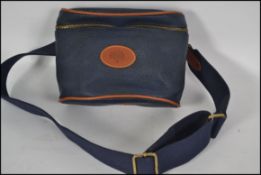 A vintage Mulberry scotch grain bumbag / waist bag / fanny pack in blue leather with canvas woven
