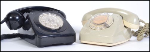 Two 20th century retro telephones one being a vintage BT model the other being a 1960s German