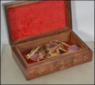 A collection of vintage gilt / gold plated jewellery to include necklaces, bracelets, puzzlers,