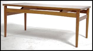 A vintage mid 20th century retro teak wood floatin