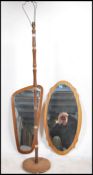 A pair of 1970's retro frameless teak wall mirrors of atomic form. Differing shaped with frameless