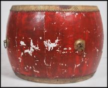A very large Chinese lacquered double ended temple drum, 20th century, circular beating skin surface