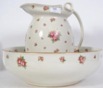 A Royal Doulton early 20th century Chintz pattern large jug and washbowl being stamped to the base