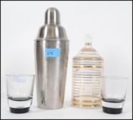 A retro vintage mid century cocktail shaker with c