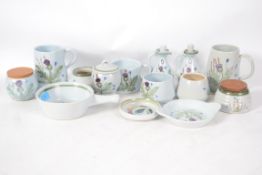 A good collection of studio pottery by Buchan to include several pieces of various design. Please