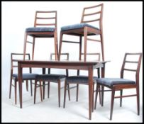 A good 1960's Danish inspired teak wood dining tab