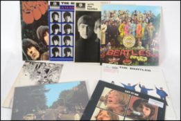 A collection of vinyl long play LP records pertaining to The Beatles to include Rubber Soul, Abbey