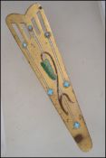 A beautiful early 20th century Art Nouveau ladies belt buckle adorned with turquoise and enamel leaf