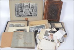 A good leather early 20th century photograph album with bronze plaque to centre having portrait