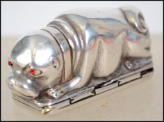 A Russian silver pug dog snuff, Hinged plinth base