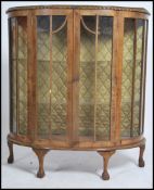 A 1930's walnut Queen Anne revival china display c