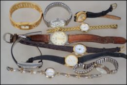 A collection of 10 ladies and gents watches.