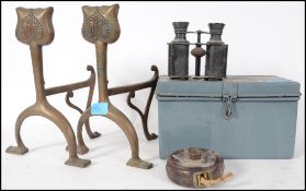 A pair of Arts & Crafts brass firedogs together wi