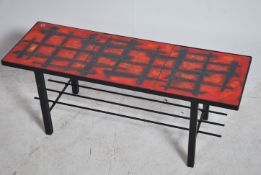 A retro 1960's Fat Lava ceramic and metal coffee table of rectangular form with tubular metal